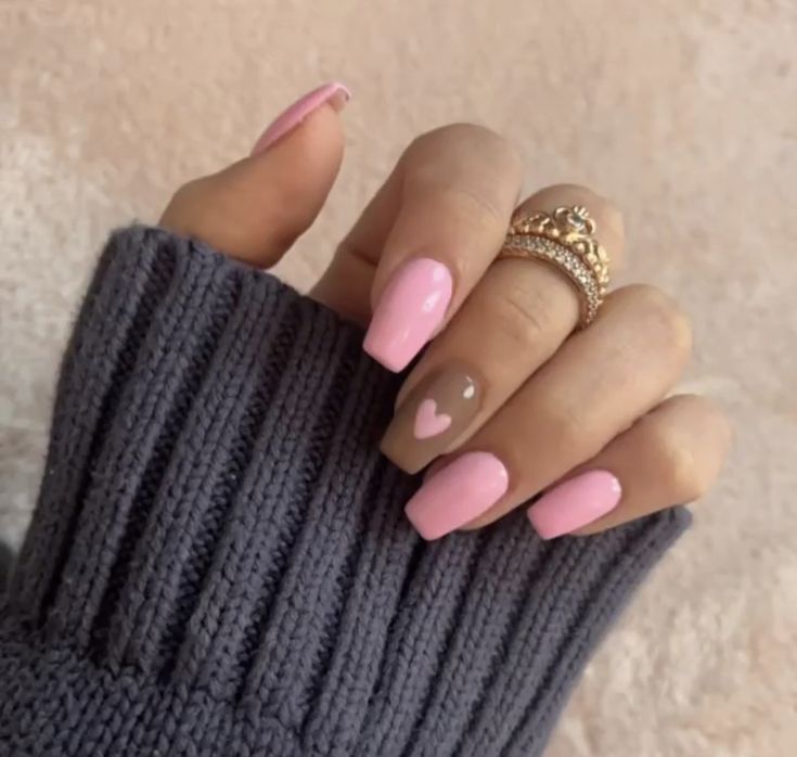 Charming Pastel Pink and Muted Brown Nail Design with Heart Accent