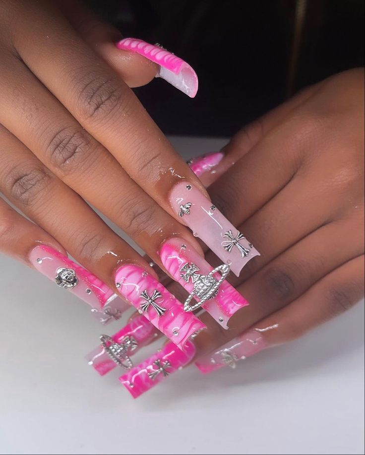 Striking Bold Pink and Translucent Nail Design with Glamorous Embellishments