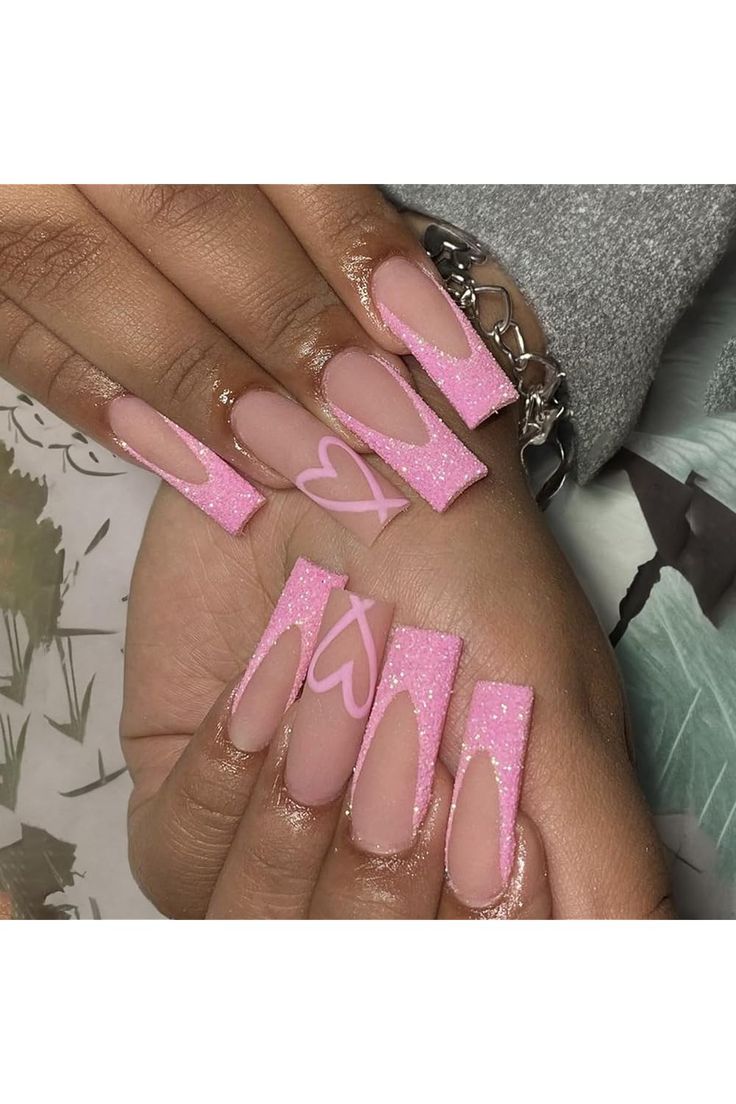 Trendy Pink Nail Design with Matte and Glitter Finishes, Bold Shapes, and Heart Accents