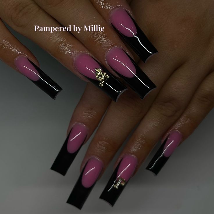 Bold Pink and Black Nail Design with Glossy Finish and Glamorous Embellishments