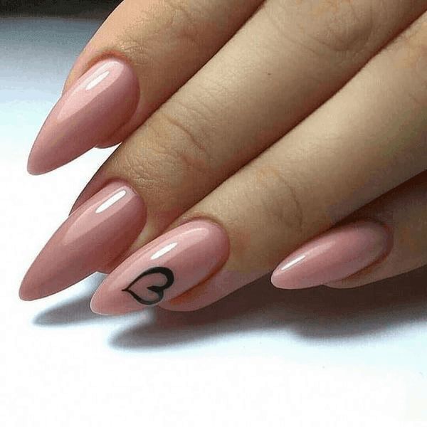 Chic Soft Pink Almond Nails with Glossy Finish and Playful Heart Design.