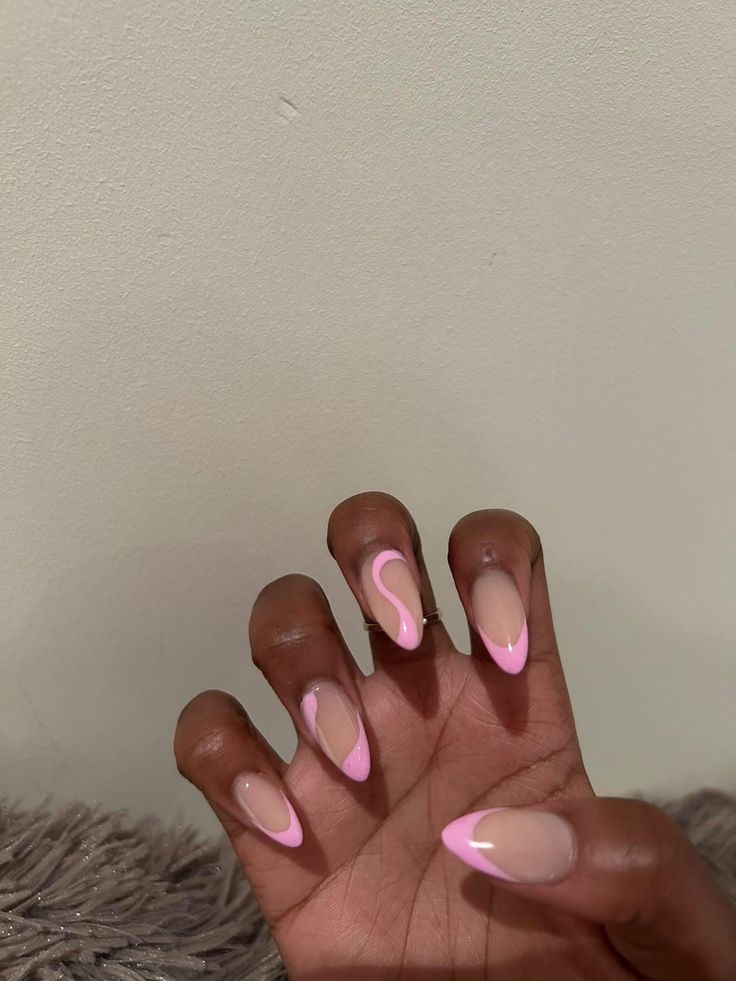 Chic Nude Nail Design with Striking Pink Accents and Modern French Tips