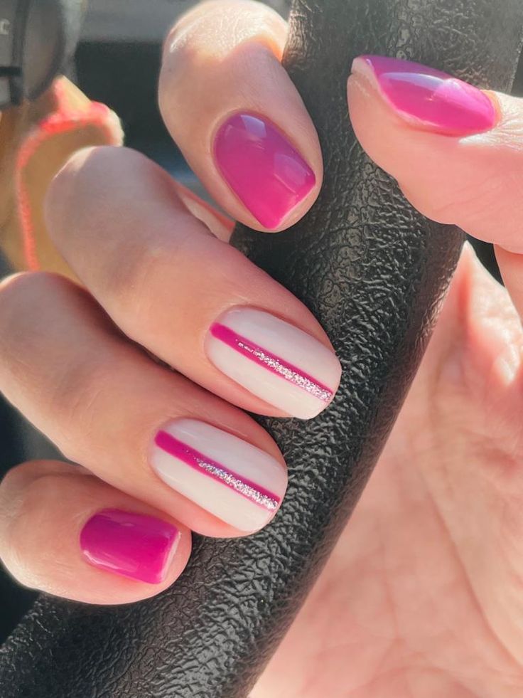 Vibrant Pink and White Nail Design: A Playful and Chic Contrast.