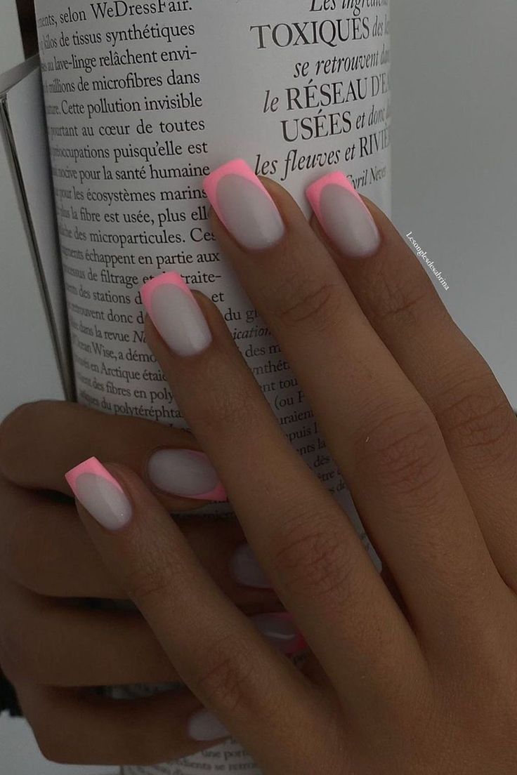 Chic Matte White Nails with Elegant Pink Tips for a Modern Aesthetic.