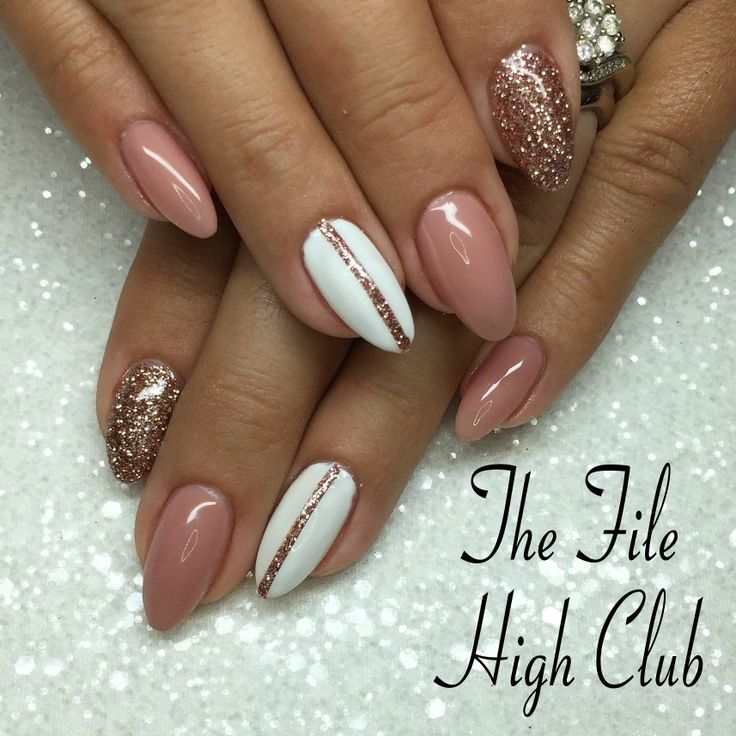 Sophisticated Nail Design: Soft Pink and White with Glittery Accents and Mixed Finishes.