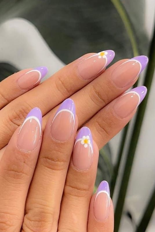 Chic Lavender and Nude Nail Design with Floral Accents.