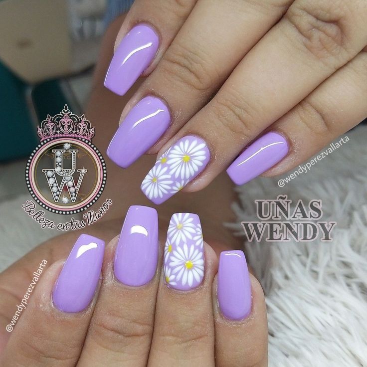 Chic Lavender Nail Design with Glossy Finish and Dainty Daisy Accents for Spring and Summer.