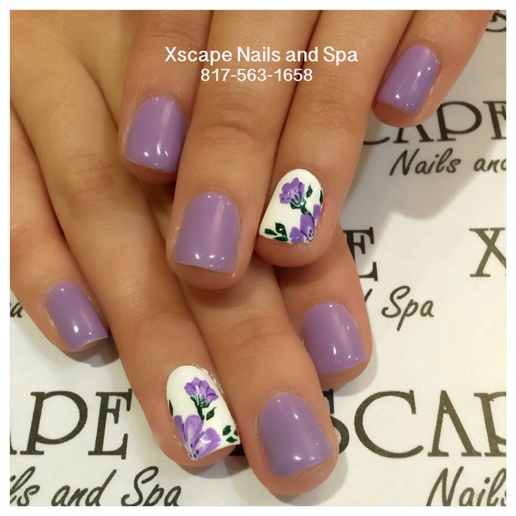 Elegant Lavender Nail Design with Glossy Finish and Floral Accent