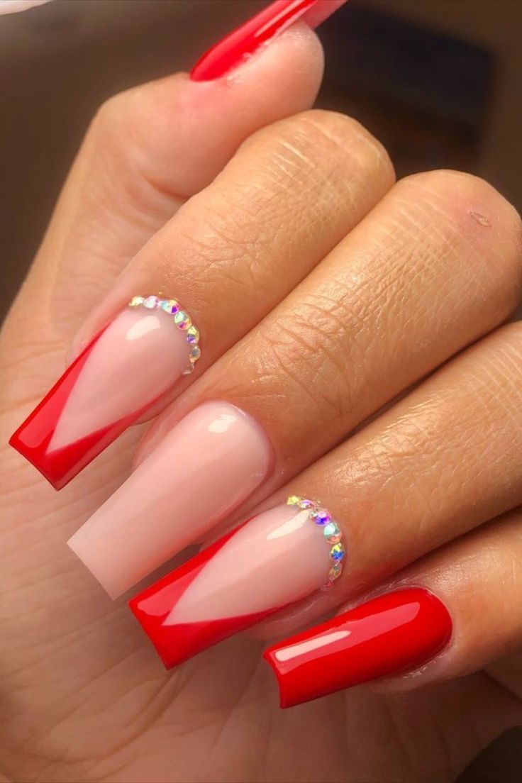 Chic Red and Nude French Tip Nail Design with Rhinestone Accent for a Glamorous Statement.