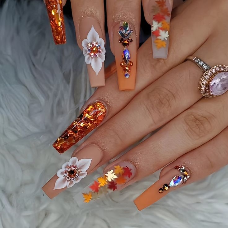 Autumn-Inspired Nail Design: A Stunning Fusion of Floral Elegance and Sparkling Gems