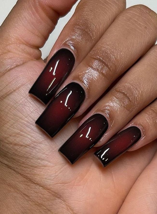 Elegant Ombre Nails: A Dramatic Black-to-Burgundy Gradient with Glossy Finish for Bold Glamour.