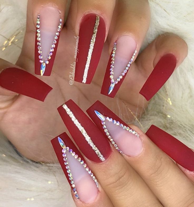 Glamorous Matte Red Nail Design with Rhinestones and Glitter Accents.