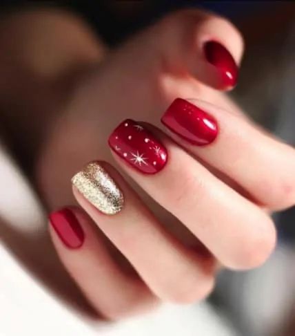 Sophisticated Red and Gold Nail Design: A Festive Combination of Elegance and Glamour.