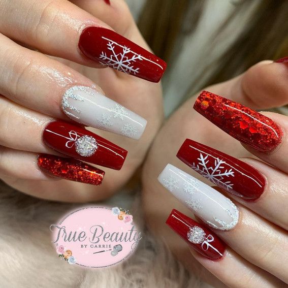 Vibrant Festive Nail Design with Red Snowflakes and Glittering White Elegance.