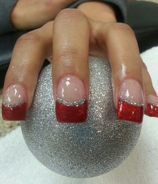 Chic Red and Silver French Tip Nail Design with Glitter for Festive Elegance