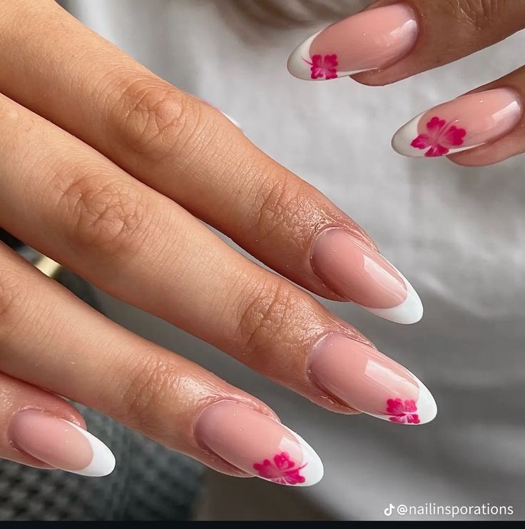 Chic Soft Pink and White Nail Design with Playful Floral Accents