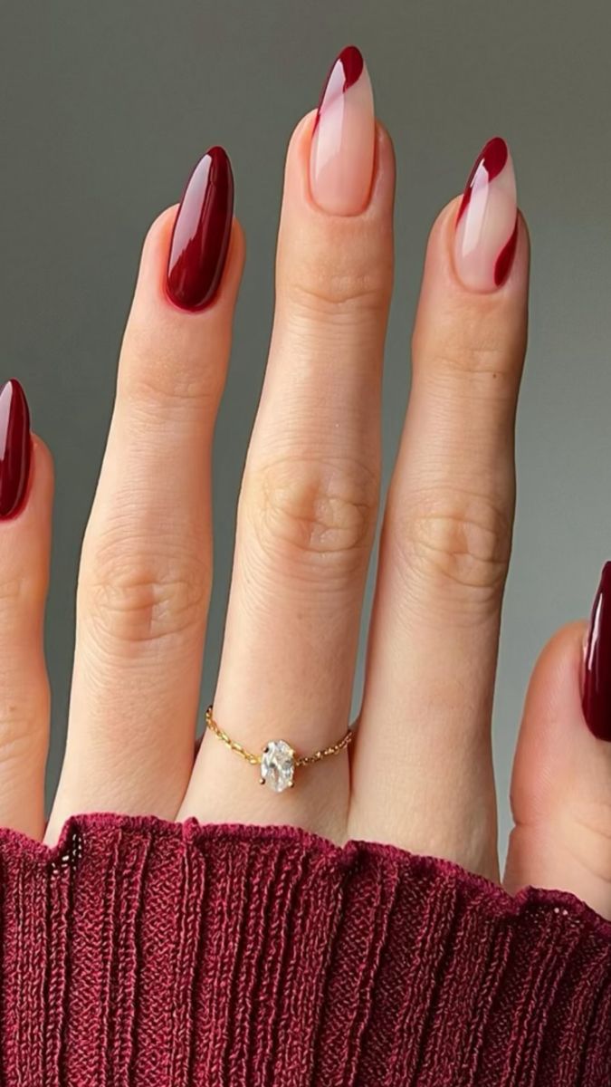 Sophisticated Nail Design: Bold Crimson Meets Soft Nude in a Chic French Twist.