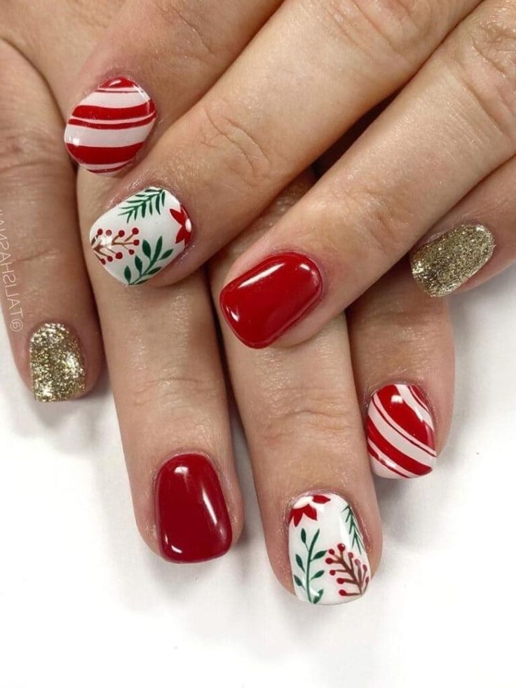 Vibrant Festive Nail Design with Stripes, Holiday Motifs, and Glamorous Glitter.