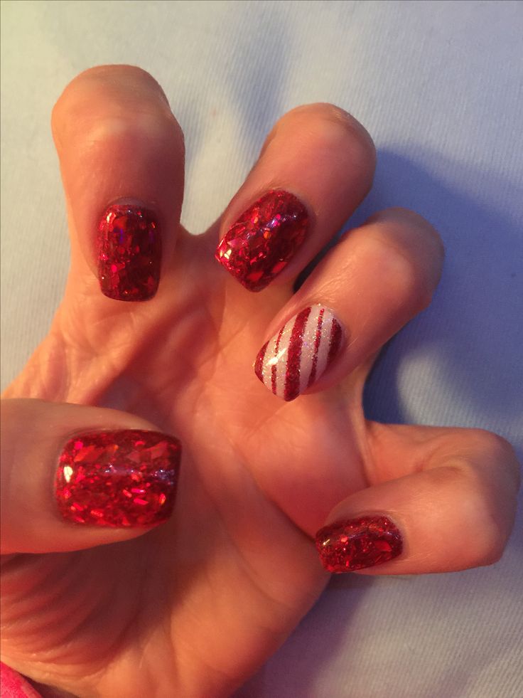 Elegant Sparkling Red Nail Design for Festive Celebrations