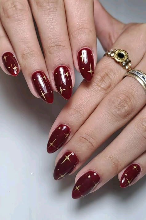 Chic Burgundy Nails with Gold Accents: Timeless Elegance for Any Occasion.