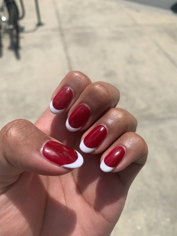 Chic Red and White Nail Design: A Modern Twist on the Classic French Manicure.