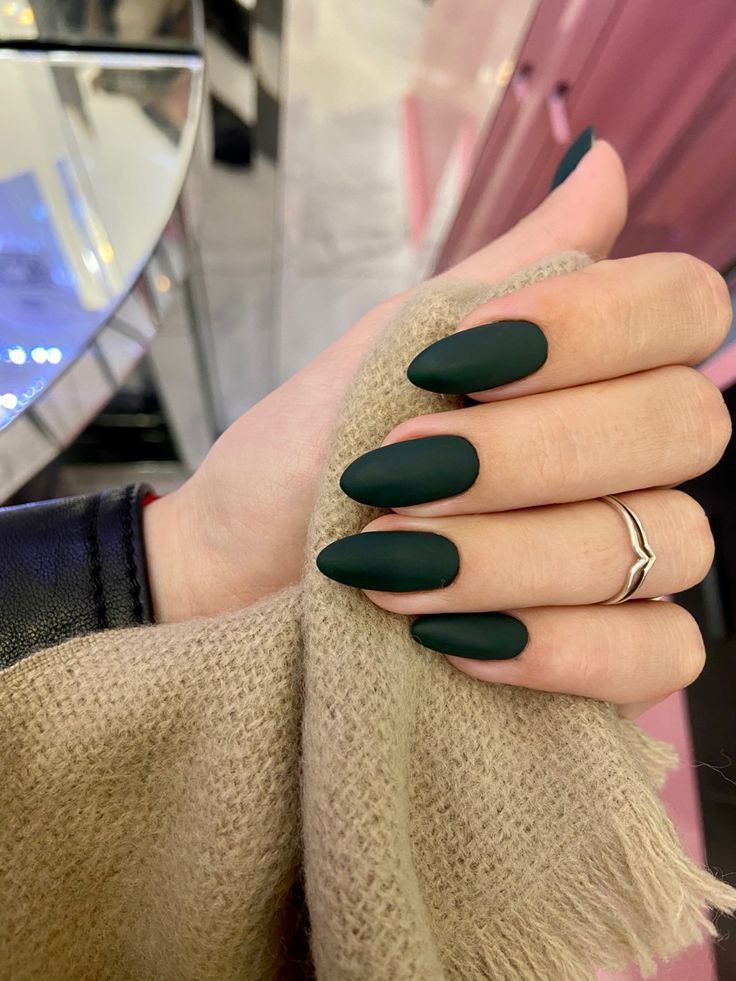 Elegant Matte Green Almond-Shaped Nails: A Striking Blend of Boldness and Refinement