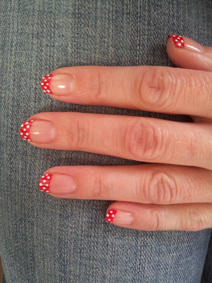 Cheerful Playful Polka Dot Nail Design with Bright Red Tips