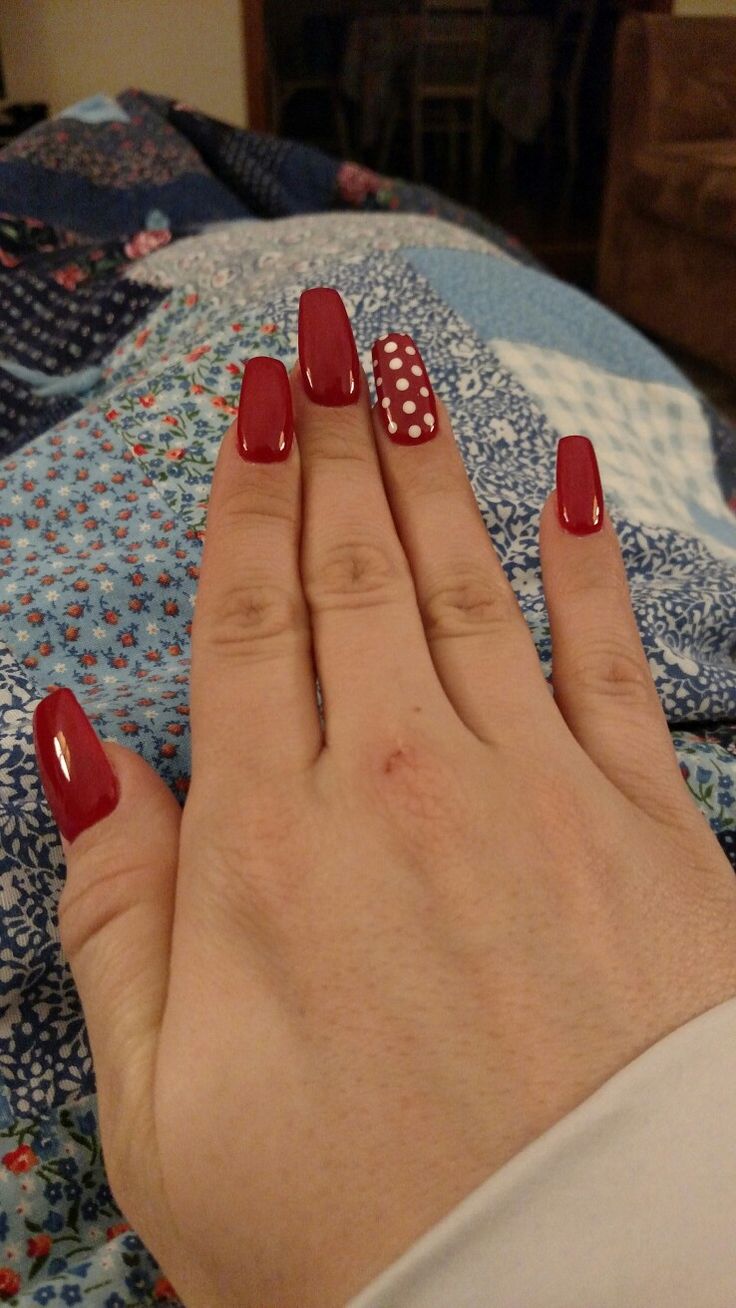 Elegant Polka Dot Red Nails: A Charming Classic Manicure Design