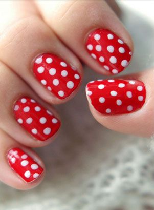 Vibrant Red Polka Dot Nail Design for a Cheerful Summer Look.