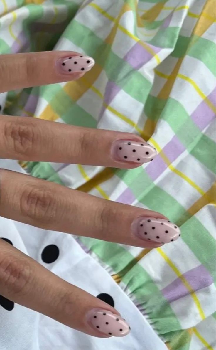 Whimsical Pink Polka Dot Nail Design for a Fun, Trendy Look.