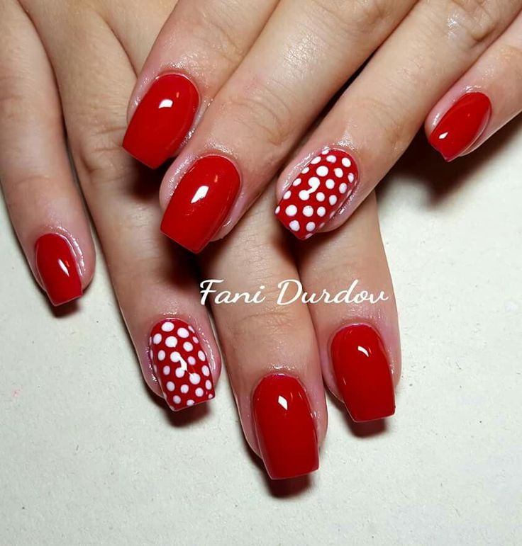 Bold Red Polka Dot Nail Art: A Chic Fusion of Elegance and Playfulness.