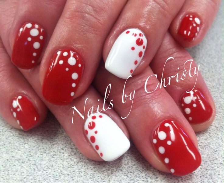 Playful Polka Dot Nail Design in Vibrant Red and Crisp White