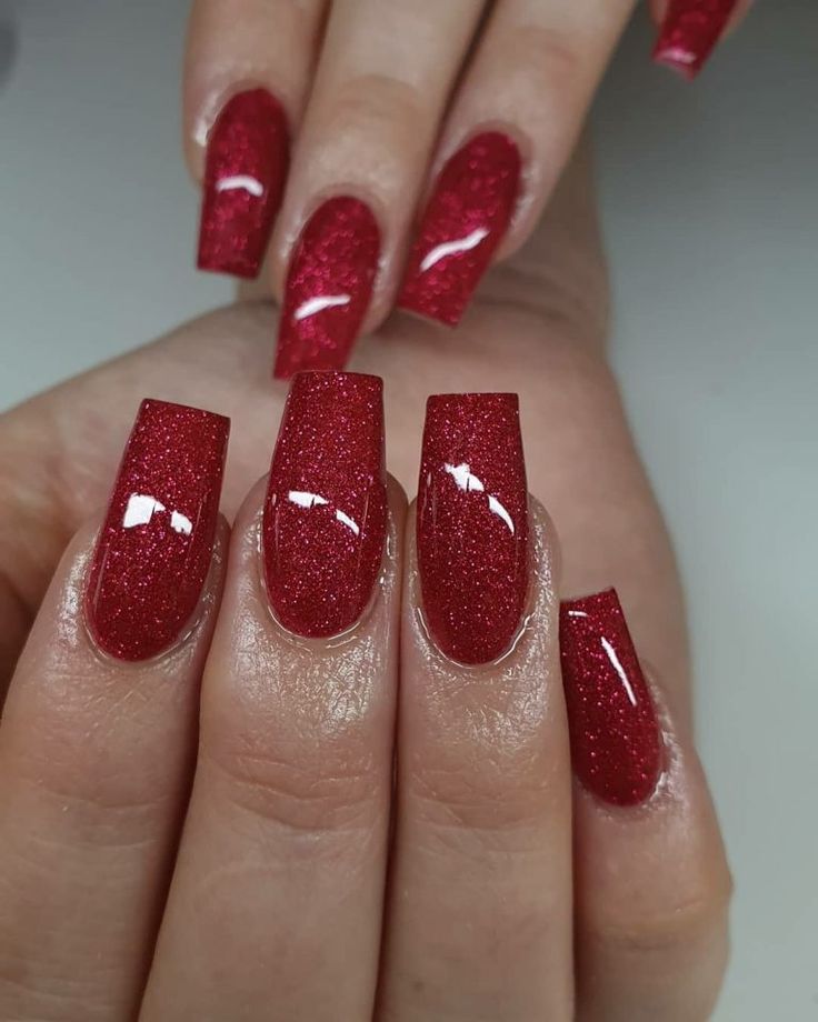 Striking Glamorous Red Glitter Nails for Special Occasions.