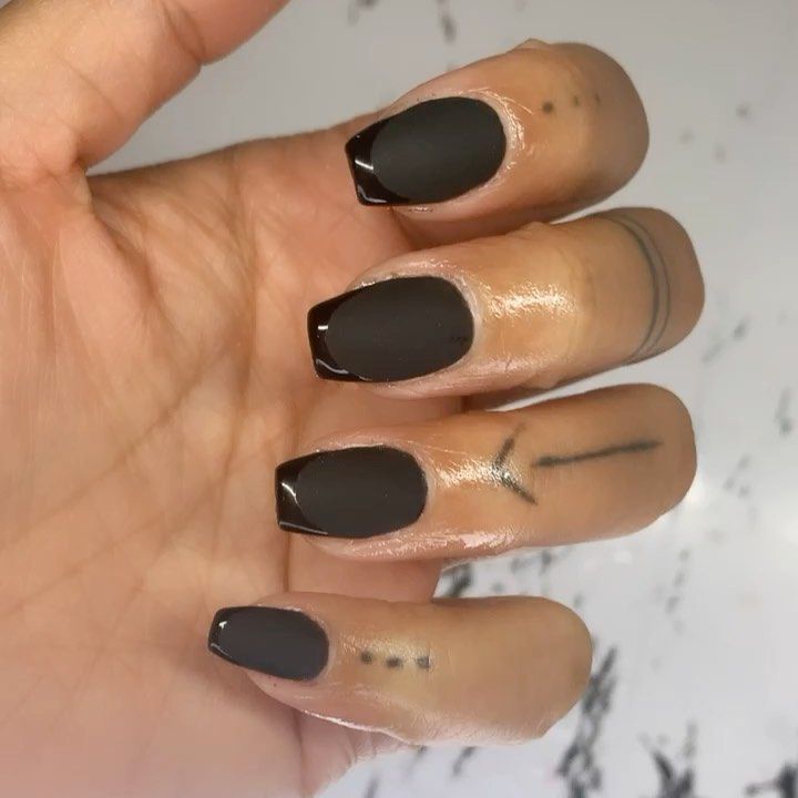 Chic Black Matte Nails with Glossy Tips and Edgy Line Tattoos for a Bold, Refined Look.