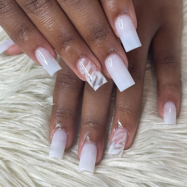 Sophisticated Elegant Marble Nail Design with Soft White Gradient and Artistic Accents.