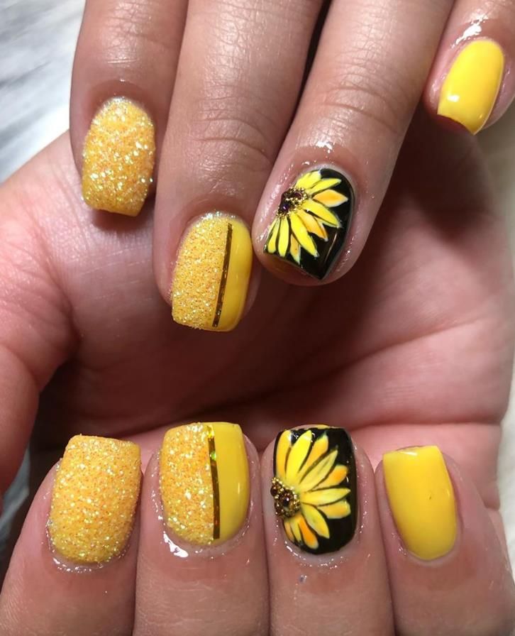 Bright Yellow Nail Design with Glitter and Cheerful Sunflower Motifs