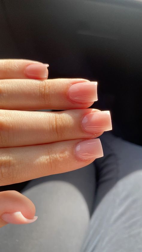 Sophisticated Elegant Nude Nail Design with Glossy Pink Finish and Square Tips