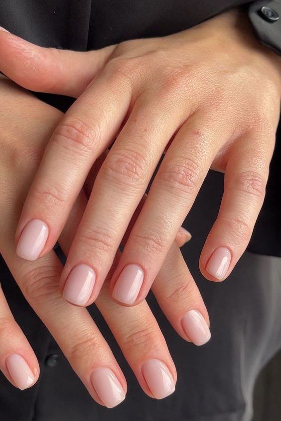 Versatile Elegant Nude Nail Design with Glossy Finish for Any Occasion