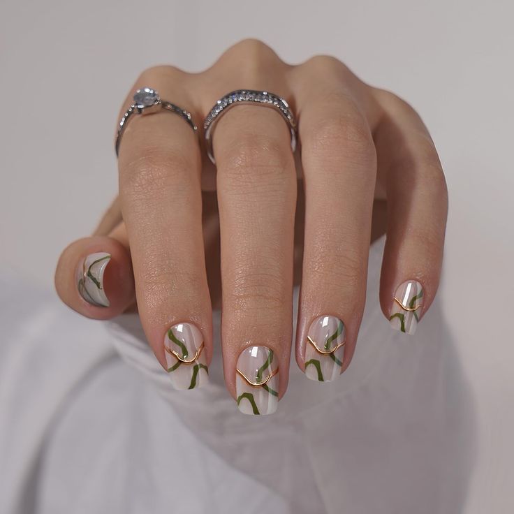 Elegant Floral Nail Design with Soft Pastels and Intricate Vines.