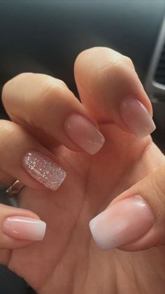 Sophisticated Gradient Nail Design with Glitter Accent for Any Occasion.