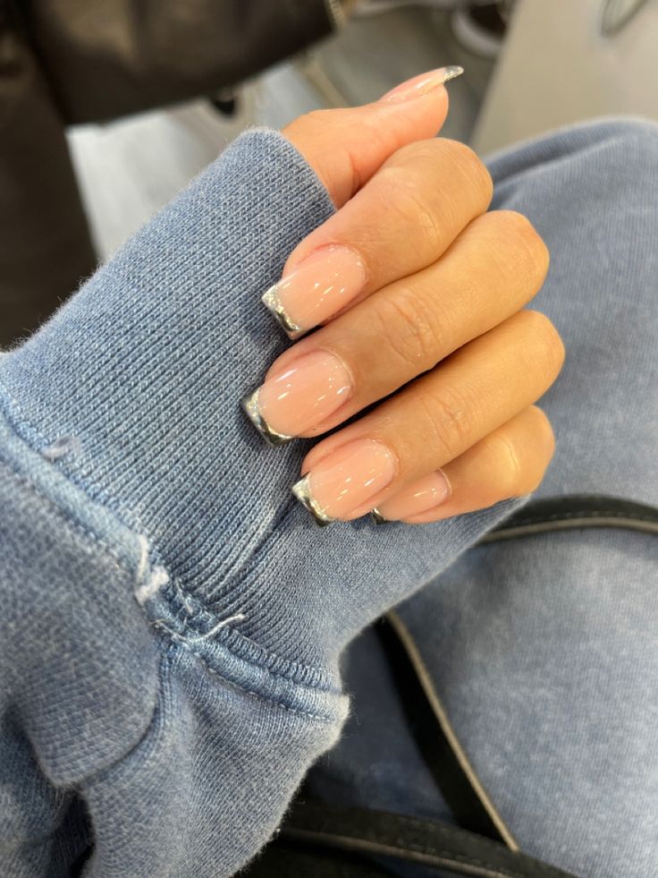 Elegant Soft Pink Manicure with Delicate Silver Tips for Any Occasion