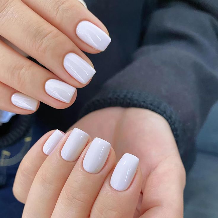 Chic Minimalist Nail Design with Soft White Polish for Versatile Elegance