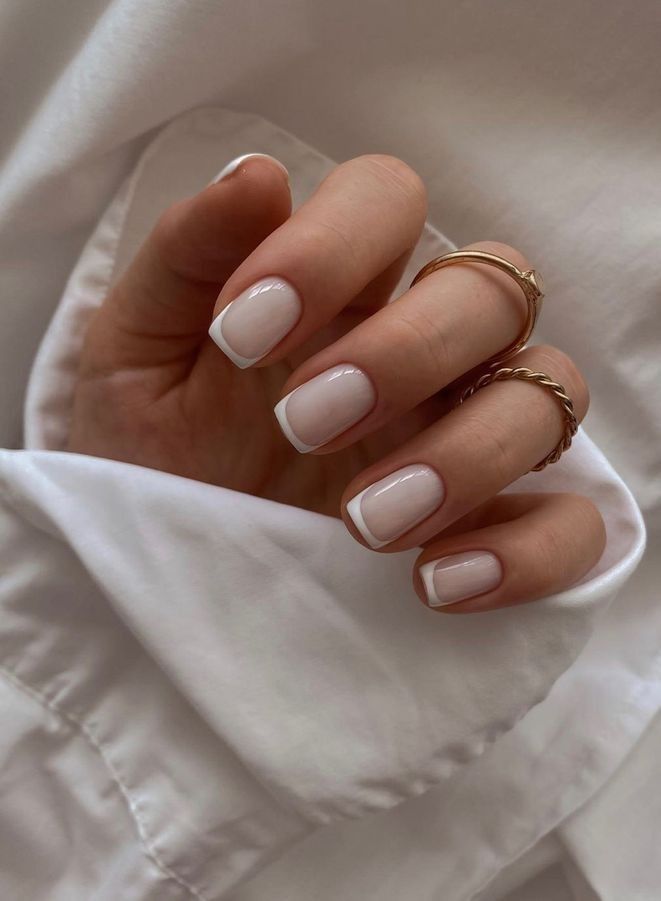 Timeless Elegance: Classic French Manicure with Gold Accents