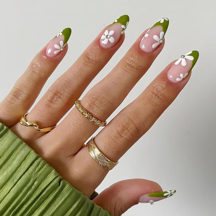 Charming Floral Nail Design: Soft Pink Base with Green Tips and White Daisies