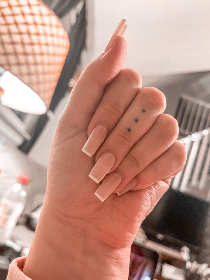 Stylish Long Square French Tip Nails with Elegant Nude Base