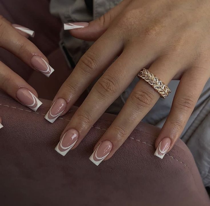 Modern Twist on Classic French Tip Manicure: Elegant Nude Polish with White Curves and Bold Accessories