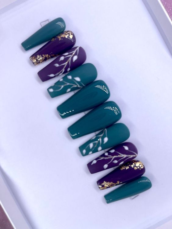 Teal and Deep Purple Elegant Nail Design with Floral Patterns and Gold Accents.