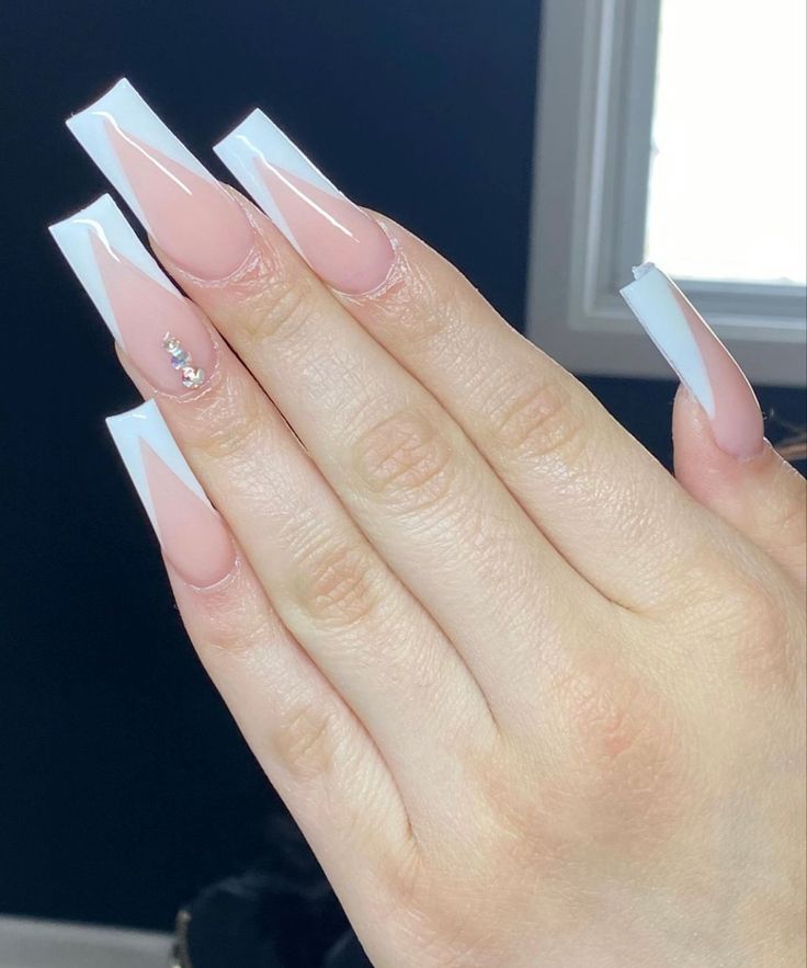 Chic French Tip Acrylic Nails: Soft Nude with Sparkling Glam Accent.