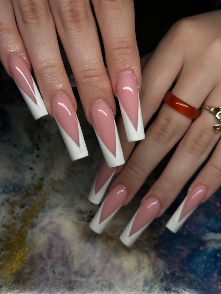 Chic V-Shaped French Manicure: A Stylish Blend of Sophistication and Edge.