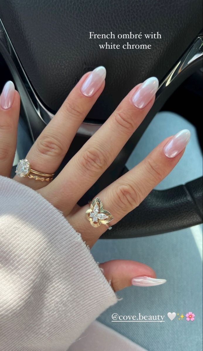 Sophisticated French Ombre Nails: Soft Pink to White with Shimmering Chrome Accents.